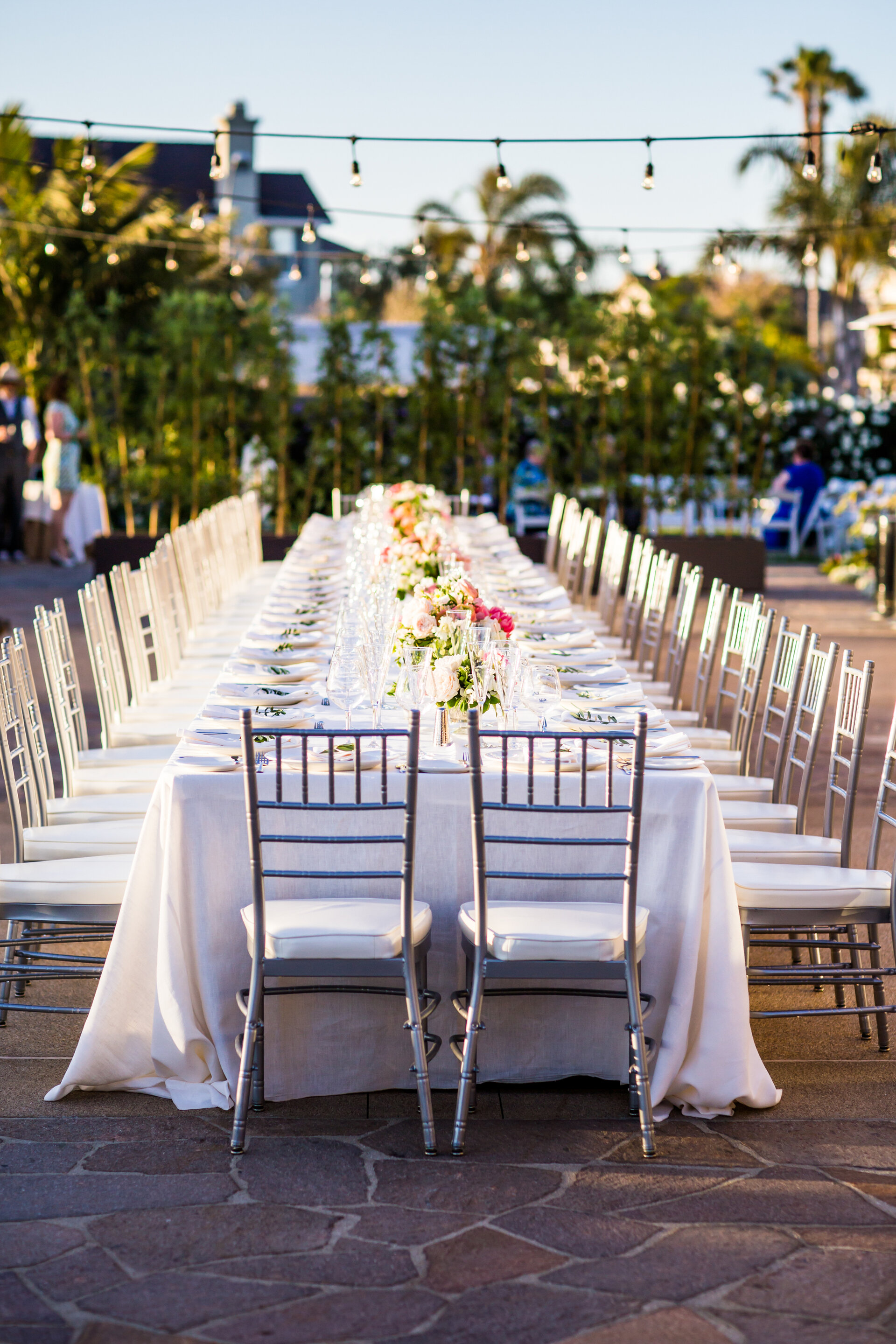 long table with floral arrangements